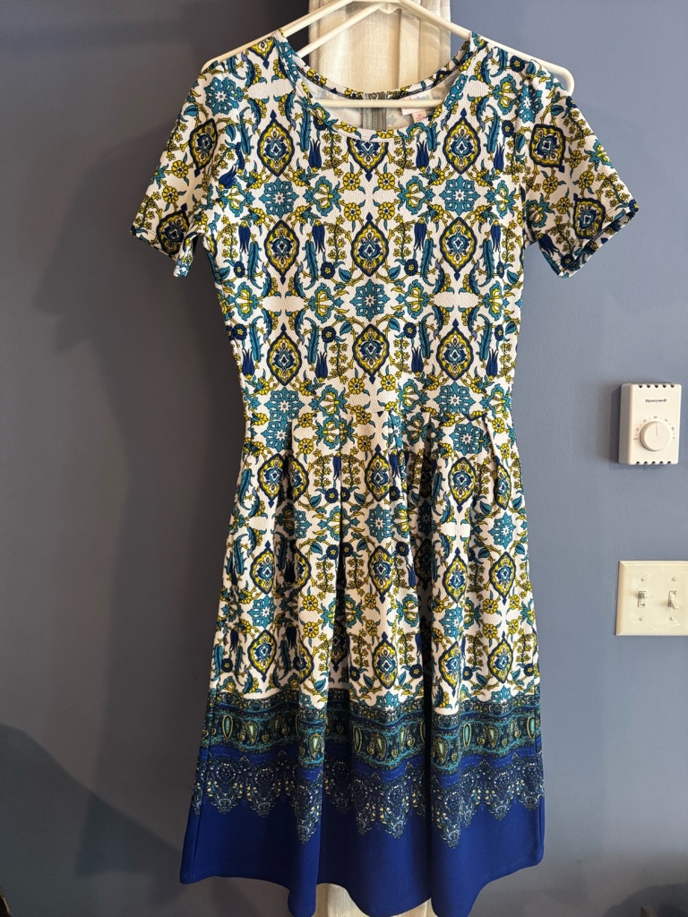 Floral Medallion Fit-and-Flare Dress in Blue and White with pockets